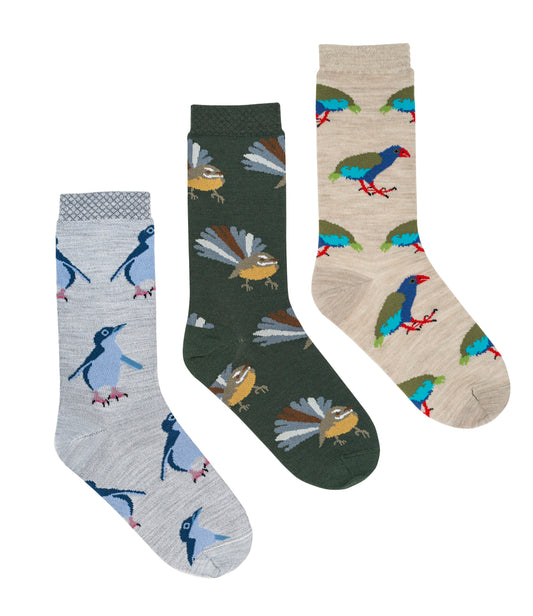 New Zealand made merino socks featuring fantail, little blue penguin, and takahe bird designs – sustainable, warm gift socks for nature lovers